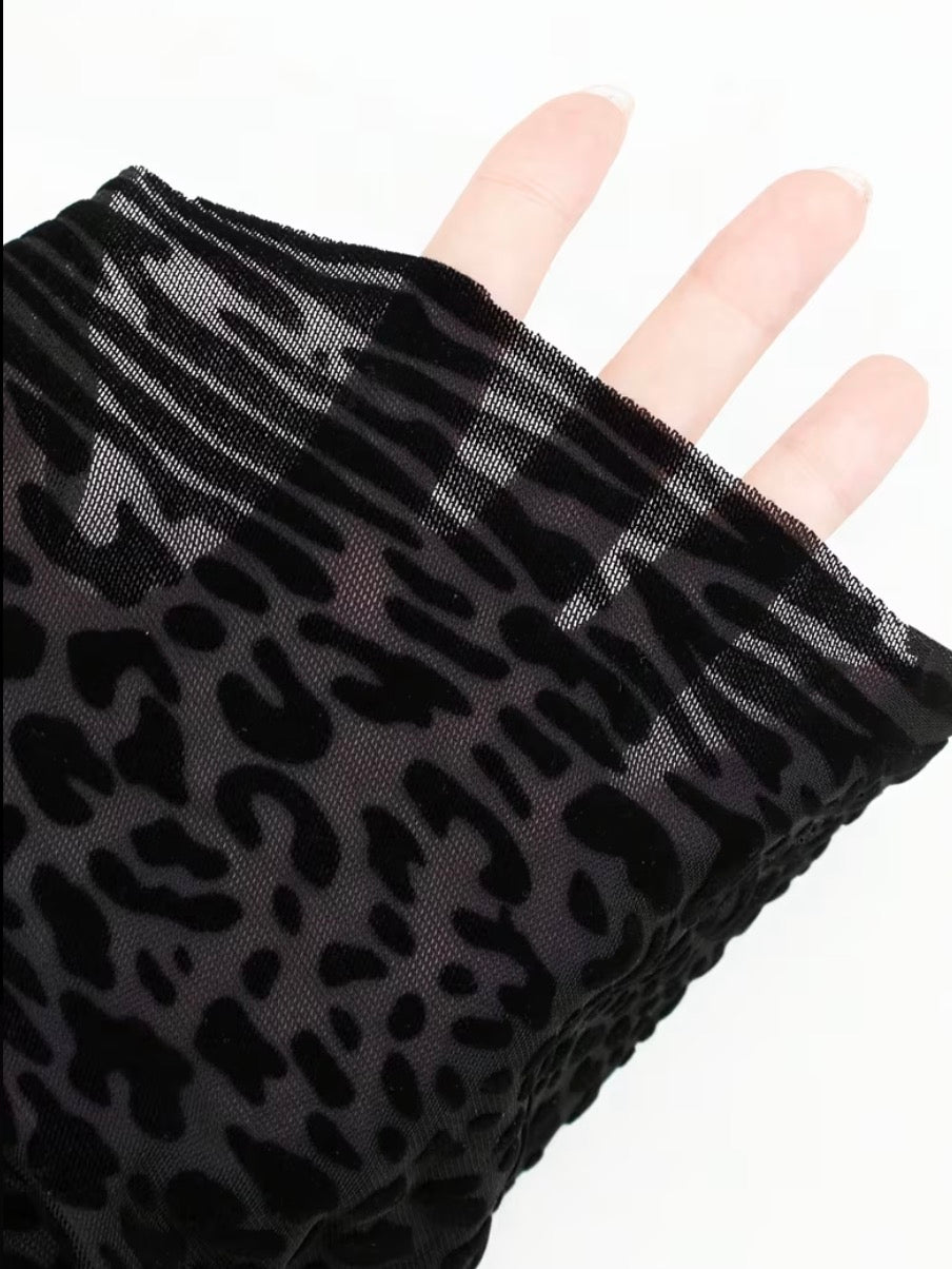 Sultry Leopard Print Long Bodycon Dress Featuring a Backless Cut & Long Sleeves